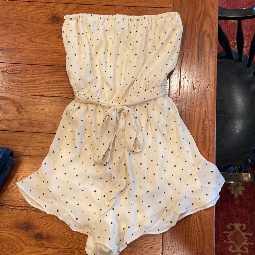 Strapless romper with navy blue stars